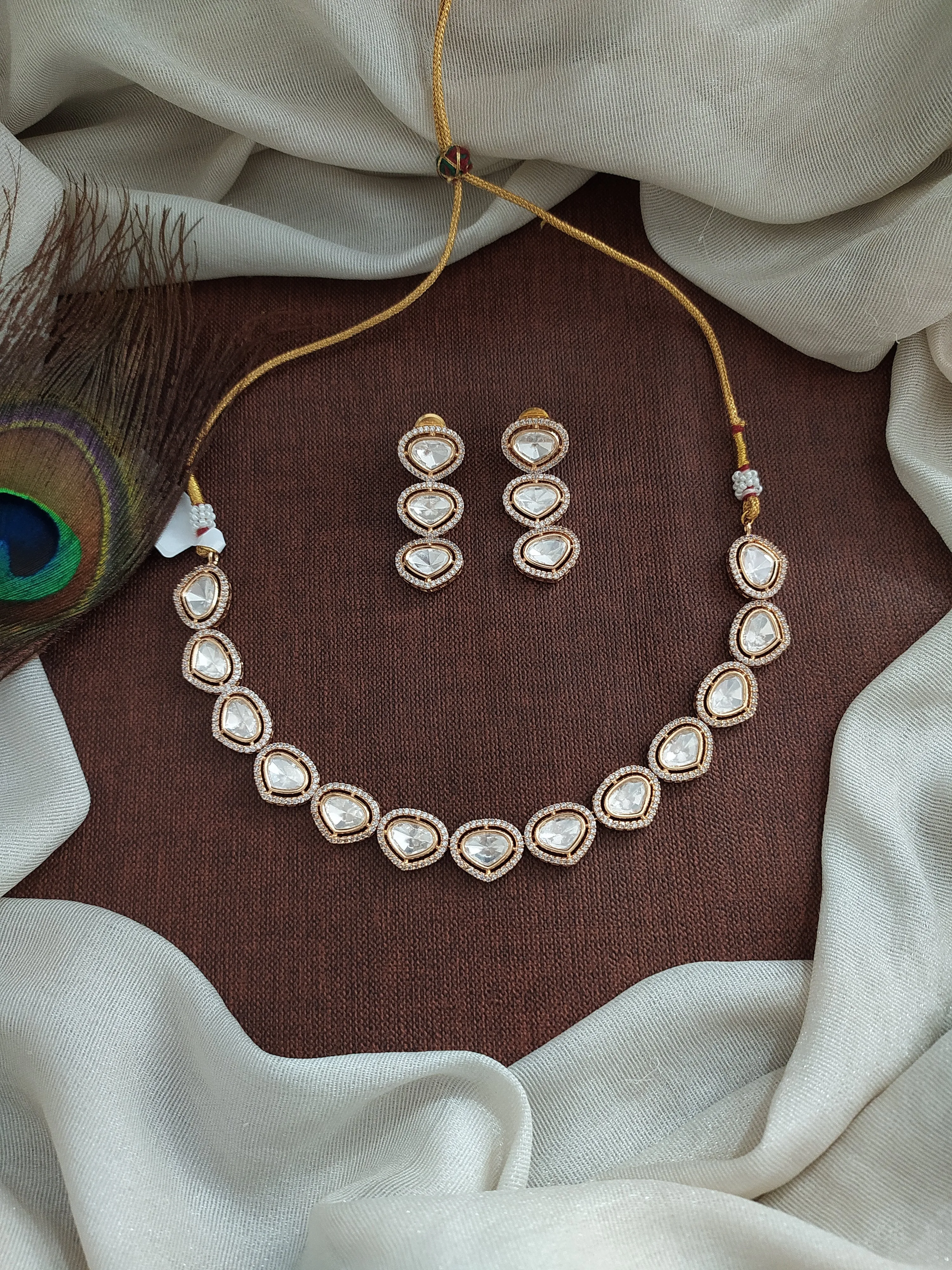 Sleek Kundan Necklace Set – Tear-Drop Shaped Kundan Stones with Matching Dangling Earrings